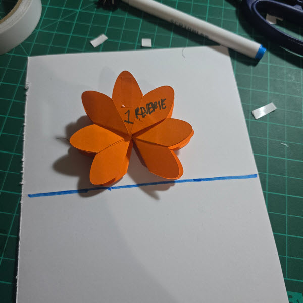 Position the flower